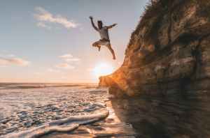 man jumps from to water